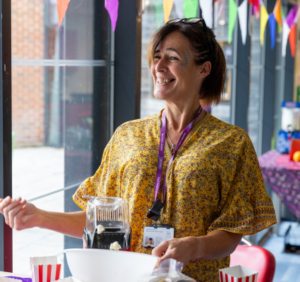 naomi house and jacksplace care staff member smiling