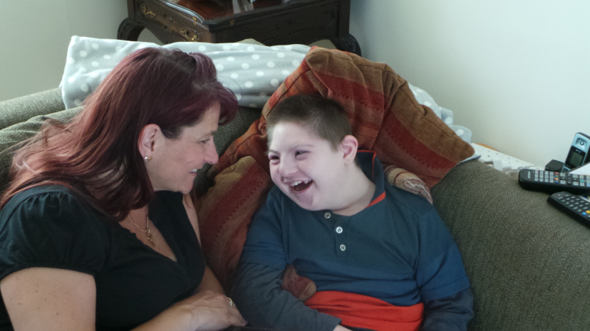 Boy smiling with mum